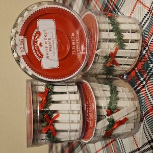 Holiday Time White Fence Decor with Red Bows and Green Garland